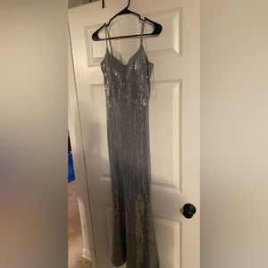 Beautiful sequin holographic long prom dress. Windsor